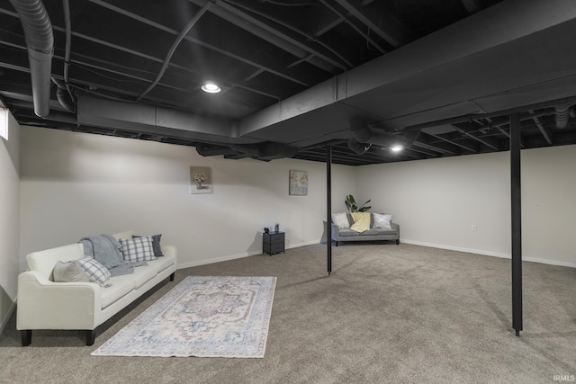 finished basement featuring carpet floors and baseboards