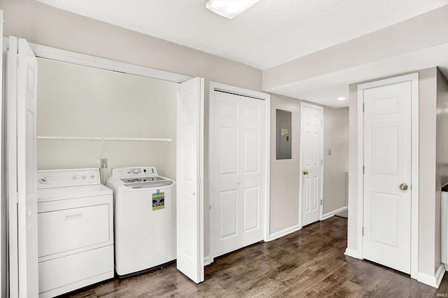 laundry area with laundry area, electric panel, dark wood finished floors, and independent washer and dryer