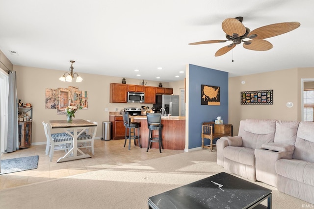 living room with light tile patterned floors, recessed lighting, visible vents, light carpet, and baseboards