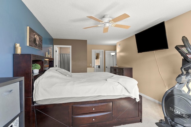 bedroom featuring carpet floors, ceiling fan, a textured ceiling, and baseboards