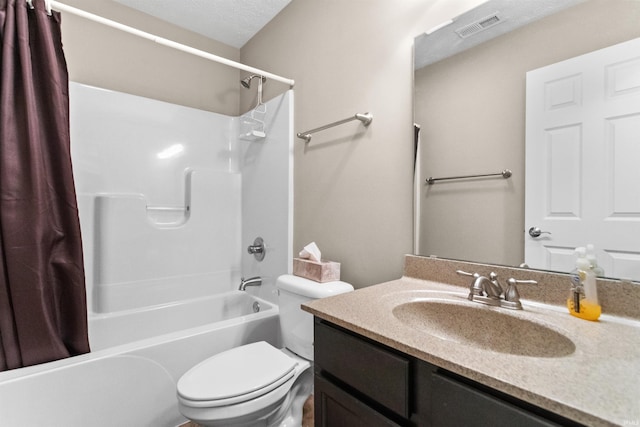 full bathroom with a textured ceiling, toilet, vanity, visible vents, and shower / tub combo with curtain