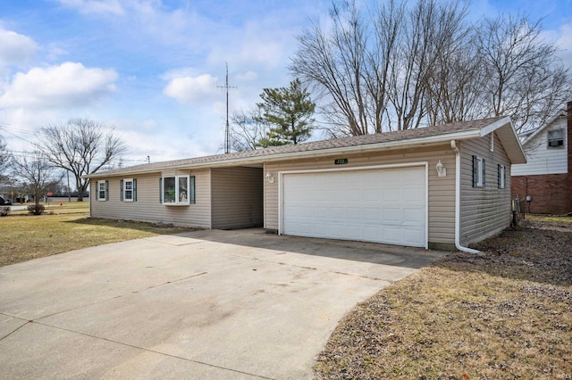 ranch-style house with an attached garage and driveway