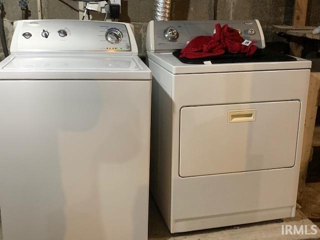 washroom with laundry area and washing machine and clothes dryer