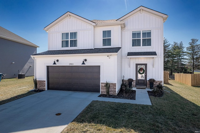 modern inspired farmhouse with board and batten siding, driveway, an attached garage, and fence