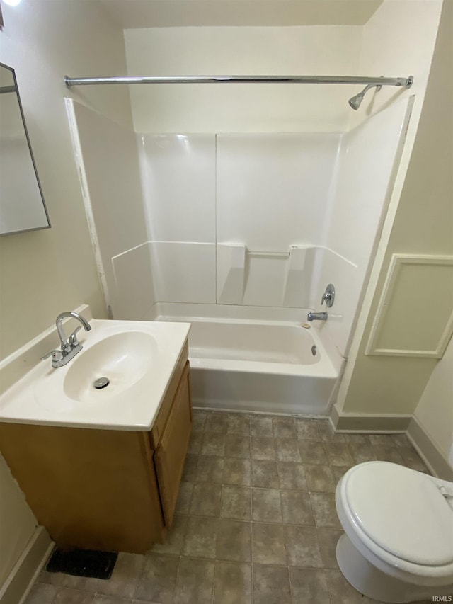 full bathroom featuring shower / bathtub combination, toilet, and vanity