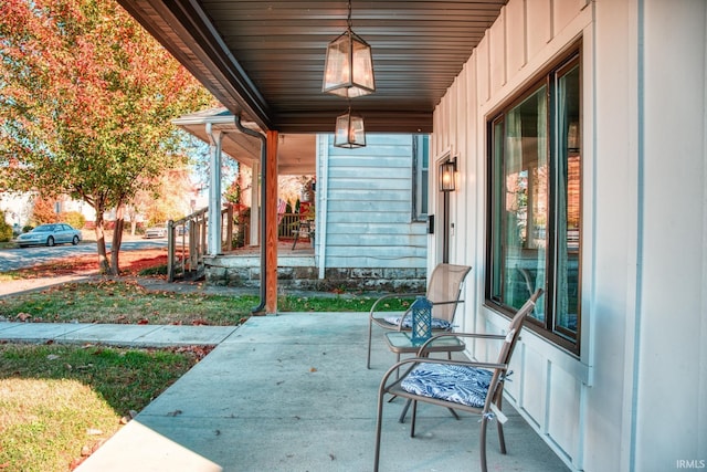 view of patio featuring a porch