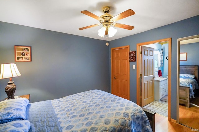 bedroom with light wood-style floors and ceiling fan