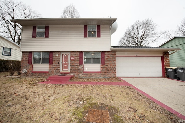 view of front of house featuring concrete driveway, brick siding, and an attached garage