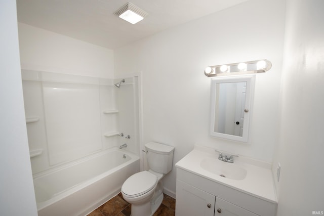 bathroom featuring shower / washtub combination, vanity, and toilet