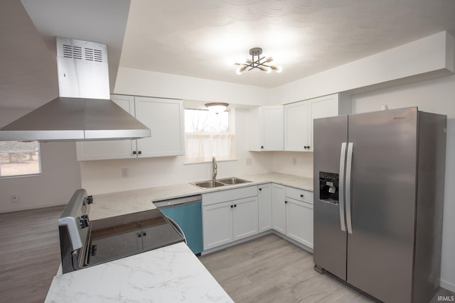 kitchen featuring a wealth of natural light, a sink, stainless steel fridge, dishwasher, and extractor fan