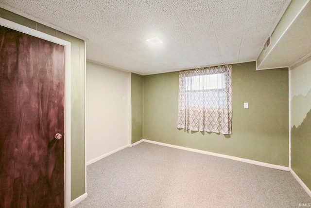 basement with carpet and baseboards