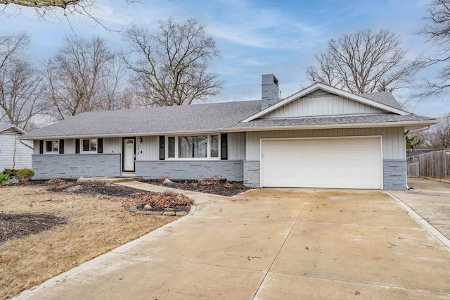 ranch-style house with a garage, fence, driveway, roof with shingles, and a chimney