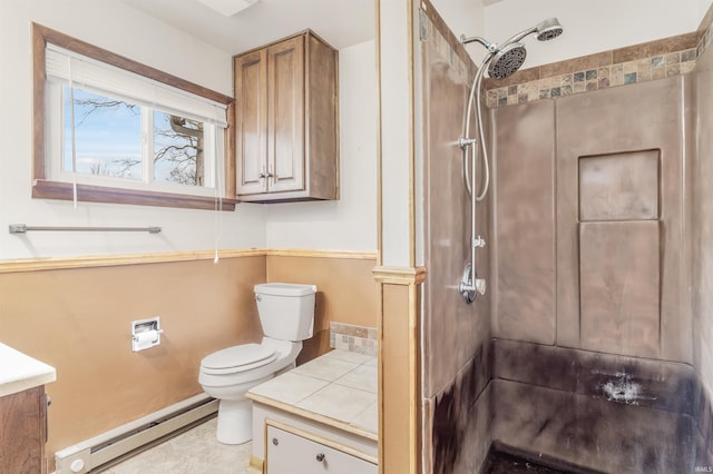 full bath with a baseboard heating unit, a shower, vanity, and toilet