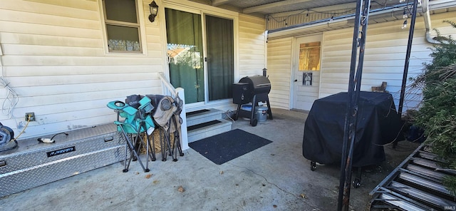 view of patio featuring a grill