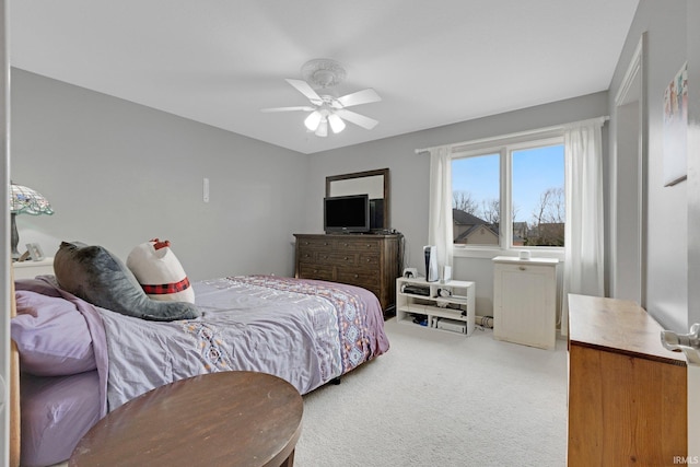 bedroom featuring ceiling fan and carpet floors