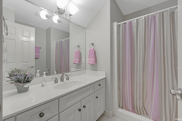 full bath with curtained shower and vanity