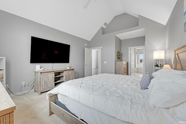 bedroom featuring visible vents, connected bathroom, ceiling fan, carpet flooring, and high vaulted ceiling