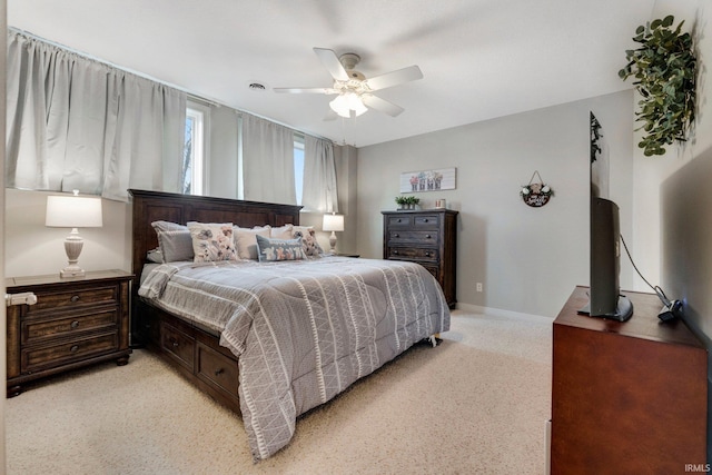 bedroom featuring baseboards and a ceiling fan