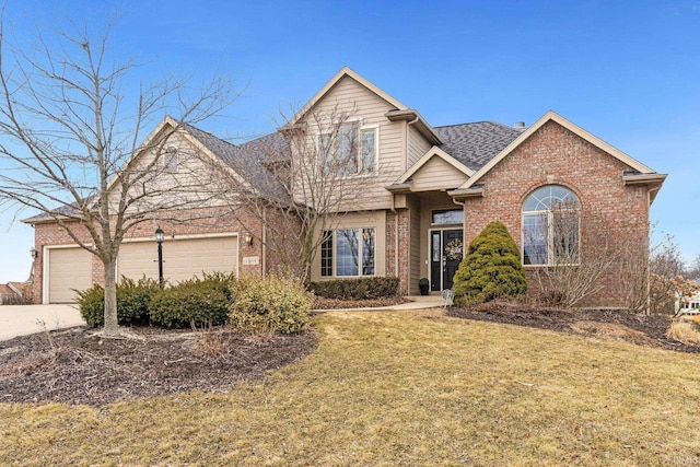 traditional home with an attached garage, brick siding, driveway, roof with shingles, and a front yard