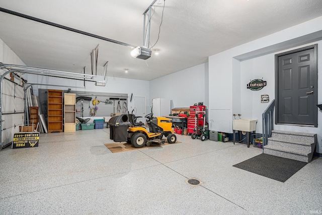 garage featuring a garage door opener