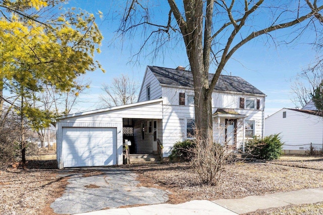 view of front of home featuring a garage and driveway