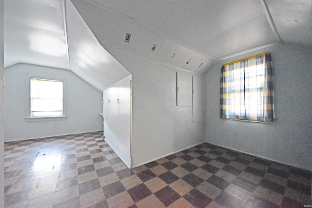 bonus room featuring vaulted ceiling