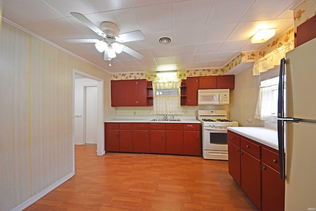 kitchen featuring white appliances, visible vents, light wood-style flooring, light countertops, and open shelves