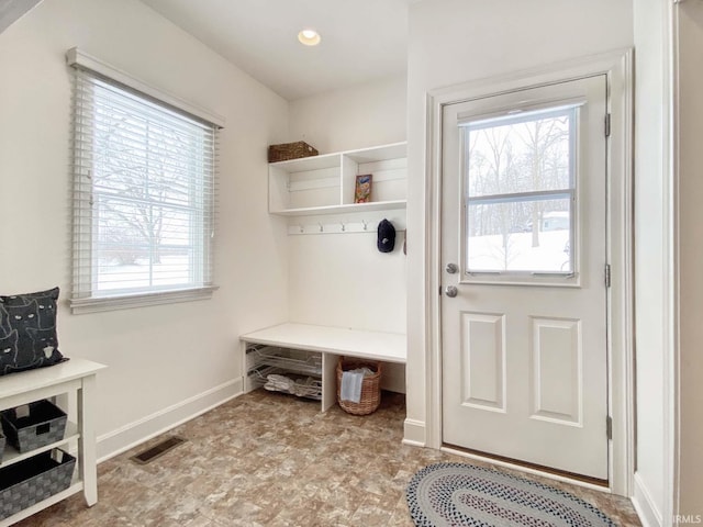 mudroom with recessed lighting, visible vents, and baseboards