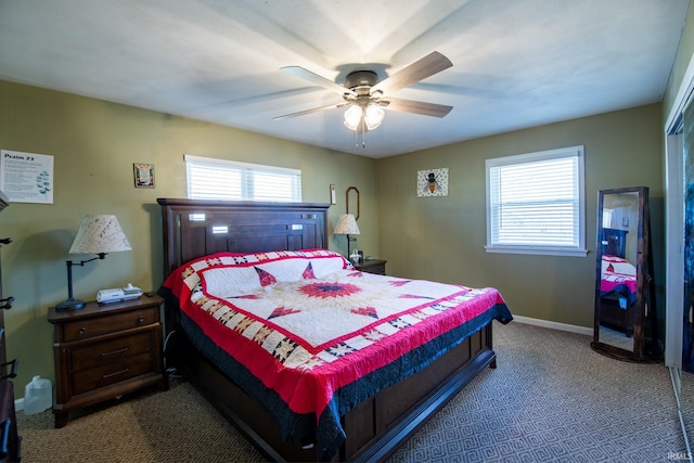 bedroom featuring carpet, baseboards, and a ceiling fan