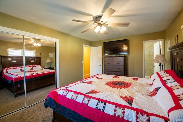 carpeted bedroom featuring a closet, connected bathroom, and a ceiling fan