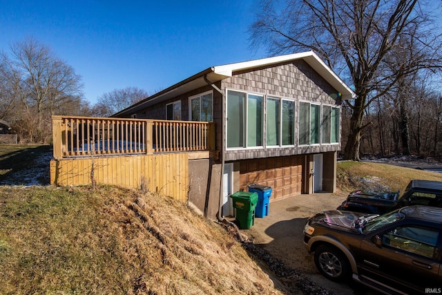 view of side of home with a garage