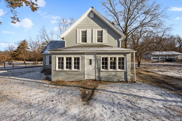 view of front of house with roof with shingles