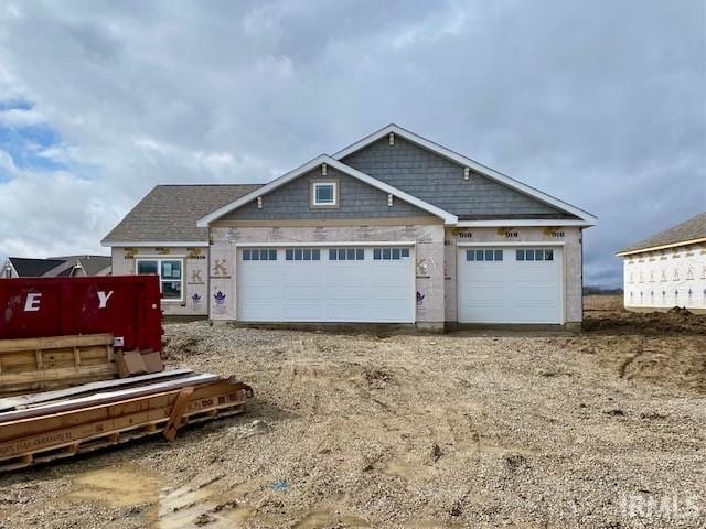 view of front of house with driveway and an attached garage