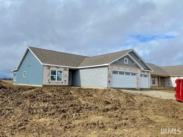 single story home with an attached garage