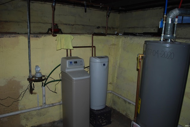 utility room with water heater