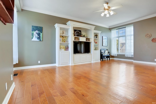 unfurnished living room with visible vents, light wood-style floors, ornamental molding, a ceiling fan, and baseboards