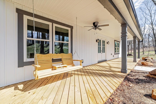 deck featuring ceiling fan and french doors