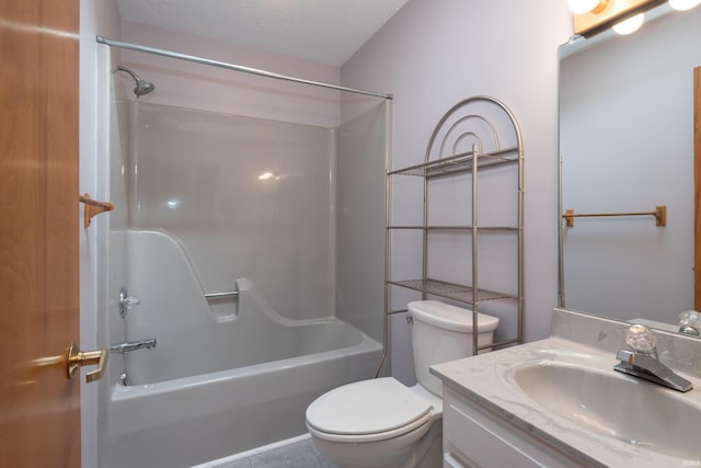 bathroom with tile patterned floors, toilet, a textured ceiling, shower / bath combination, and vanity