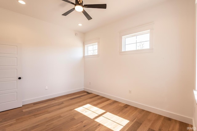 empty room with recessed lighting, baseboards, light wood-style floors, and a ceiling fan