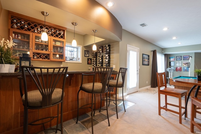 bar with visible vents, baseboards, light colored carpet, a dry bar, and recessed lighting