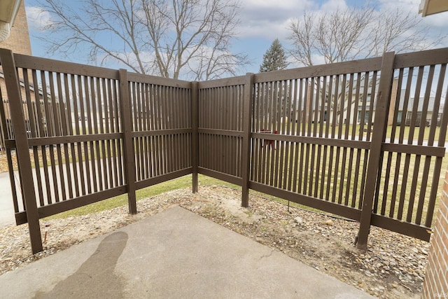 view of gate featuring fence