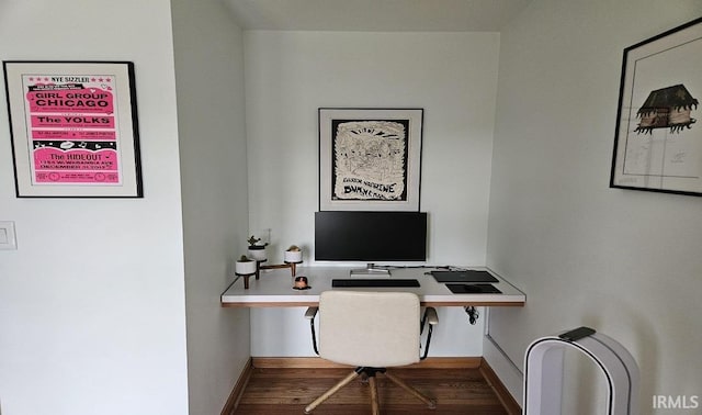 office with baseboards and wood finished floors