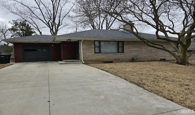 single story home featuring an attached garage, concrete driveway, stone siding, crawl space, and a chimney