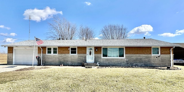 ranch-style home featuring a shingled roof, concrete driveway, a front yard, a garage, and stone siding