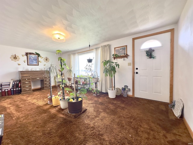 entryway with carpet floors