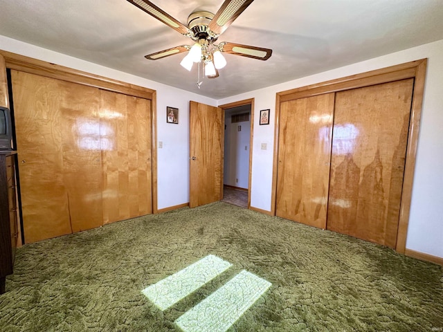 unfurnished bedroom featuring ceiling fan, carpet floors, and baseboards