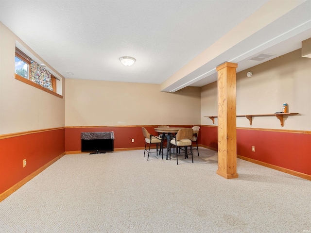 interior space featuring carpet, visible vents, and baseboards