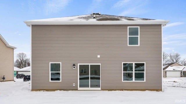 view of snow covered property