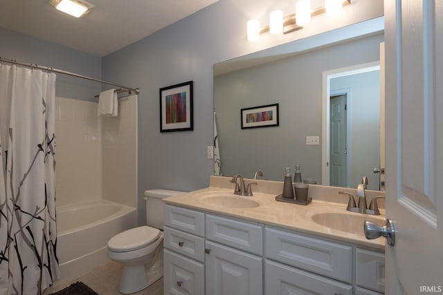 full bath with toilet, shower / tub combo, double vanity, and a sink