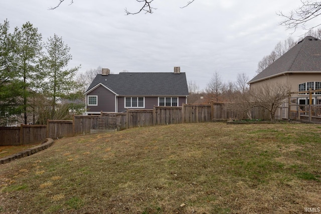 view of yard featuring a fenced backyard